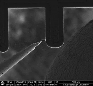 FIB preparation step 2 — trenches milled on both sides of the lamella