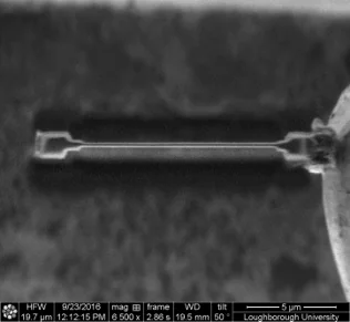 FIB preparation step 3 — lamella cut free and lifted out