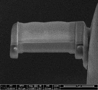 FIB preparation step 4 — lamella mounted on a grid and thinned to electron transparency